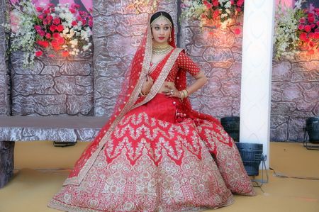 Photo of Red bridal lehenga with silver motif work
