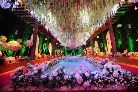 Floral aisle with hanging floral ceiling