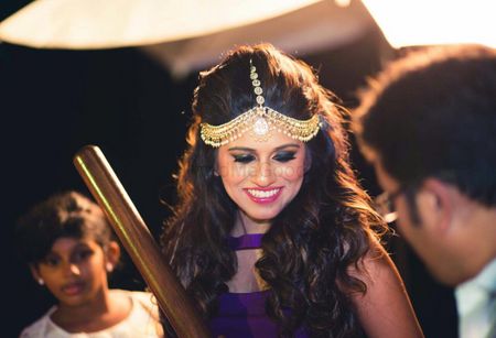 Photo of Modern mathapatti with open hair on mehendi