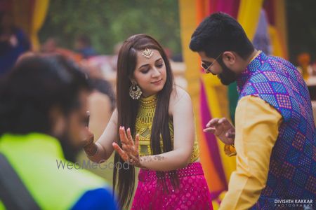 yellow and bright pink lehenga