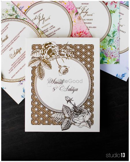 Photo of Floral printed indian wedding cards