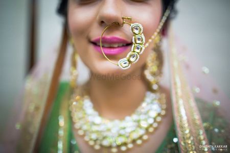 Green and gold statement bridal nath