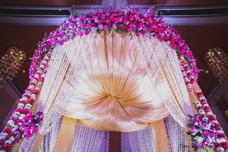 Gold and pink floral decor mandap