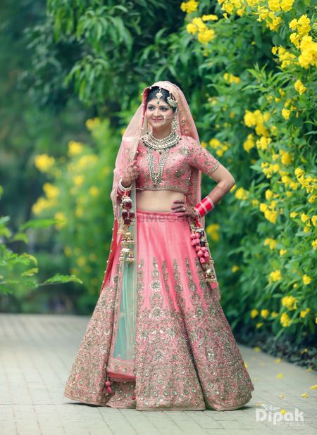 Light pink lehenga with silver work and mint dupatta