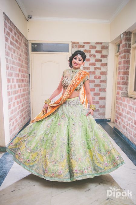 Colourful lehenga for sangeet or reception with light green and yellow