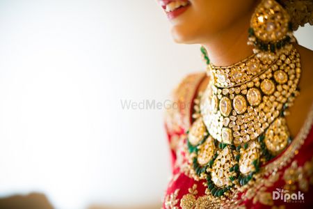 Elaborate bridal necklace with green beads