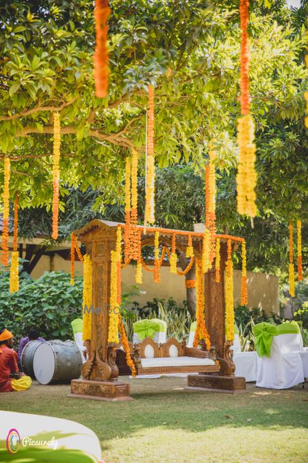 genda flower mehendi swing decor