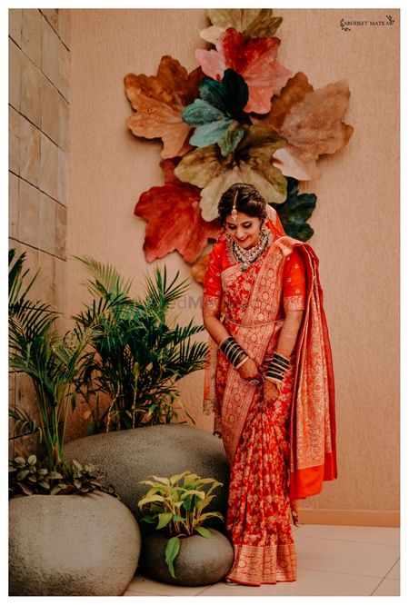 Photo of bride in a red saree