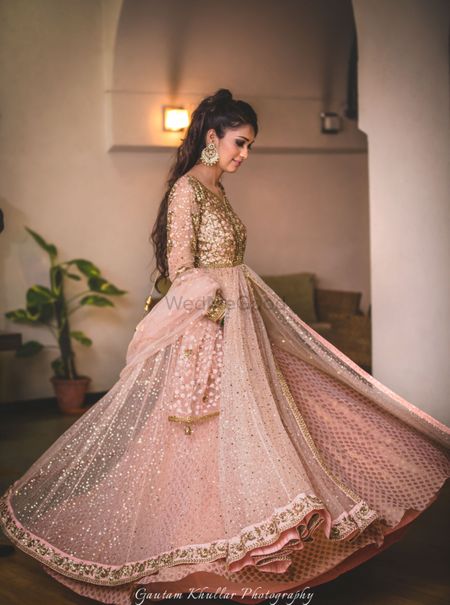 Photo of Light pink and gold pastel girly lehenga for sangeet