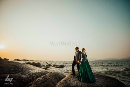 Photo of sea-side pre-wedding couple shot