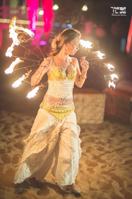 Fire dancer at sangeet for guests