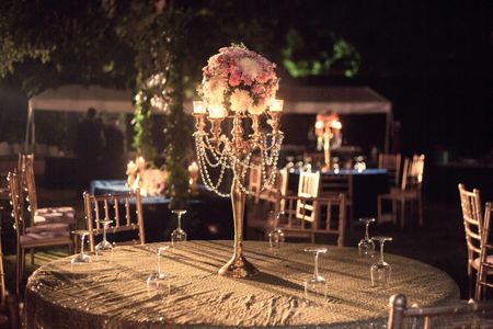 Floral candlebara centerpiece for night wedding