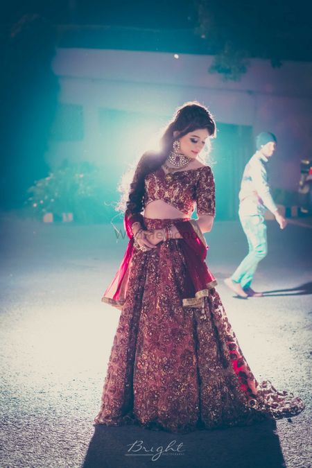Maroon and gold floral embroidery lehenga for reception