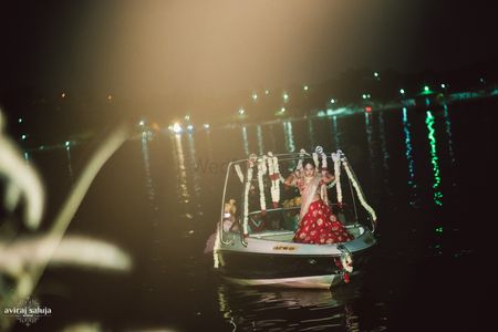 Unique bridal entry with bride entering on a boat