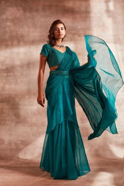Photo of Gorgeous ocean blue draped saree with belt