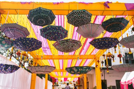 Suspended umbrella decor for South indian wedding