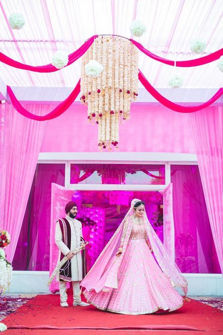 Morning wedding sikh bride in light pink lehenga and pink decor