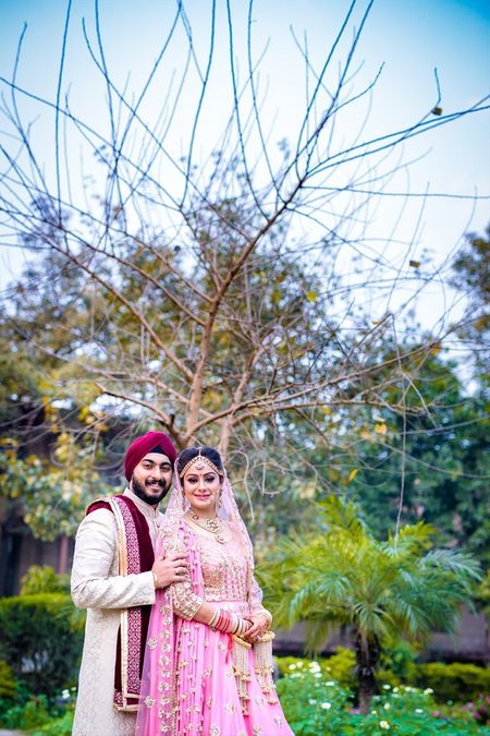 Mismatched Sikh couple portrait in morning wedding