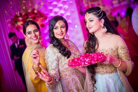 Bride with sisters on sangeet