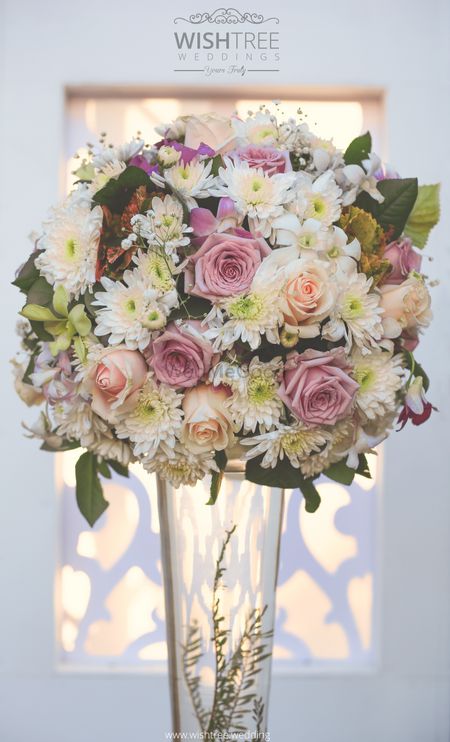 Floral vase centerpiece with white and pink flowers