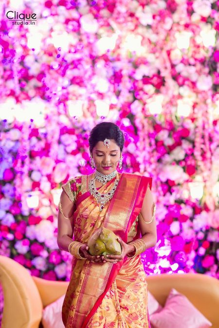 South Indian bride in red and gold kanjivaram