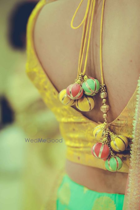 Colourful blouse latkans hanging in a bunch