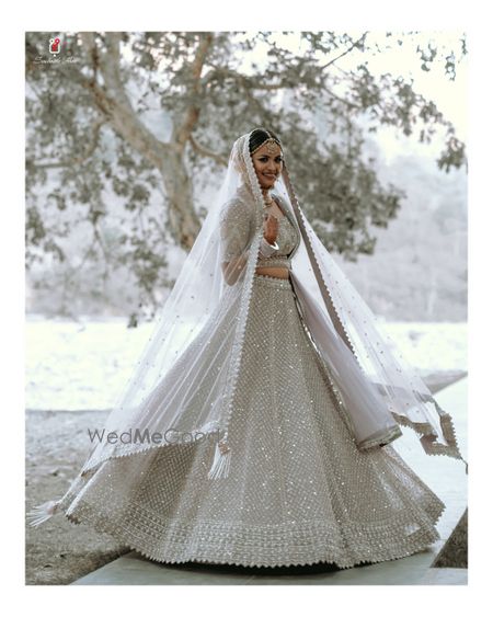 Photo of light bridal lehenga for an intimate wedding