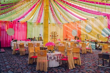 Photo of Colourful draped ceiling and pretty sitting lounges