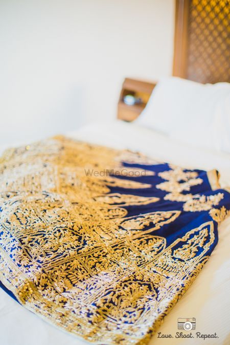 Blue velvet lehenga with gold royal embroidery
