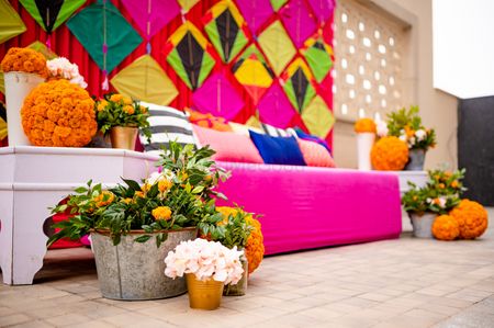 mehendi decor done with vivid hues and marigolds.