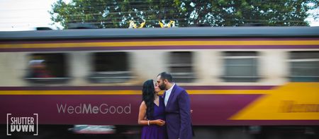 Romantic pre wedding shoot with moving train in background
