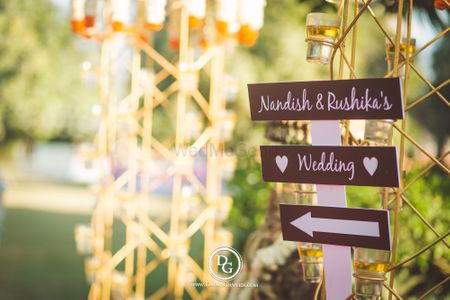 Wooden direction signboard for wedding