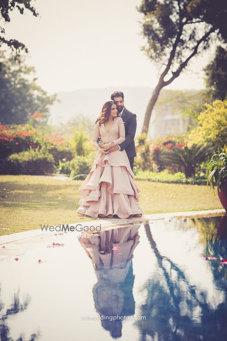Salmon pink ruffled layered gown