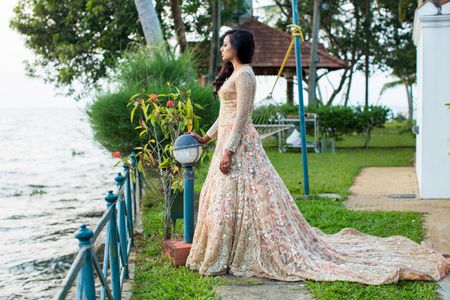 Peach embellished gown with train for Christian wedding