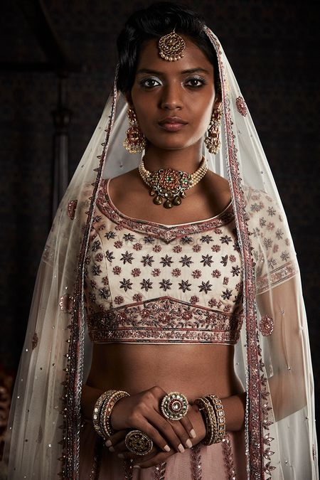 Dusky bride in white with choker necklace