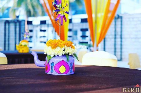 Funky and colorful tea kettle table centerpiece