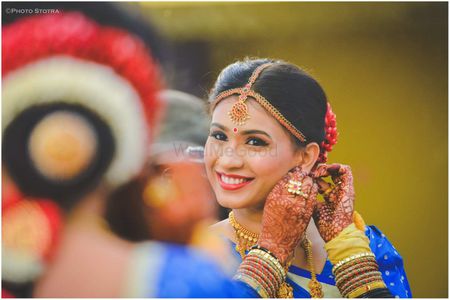 South indian bride posing in front of mirror