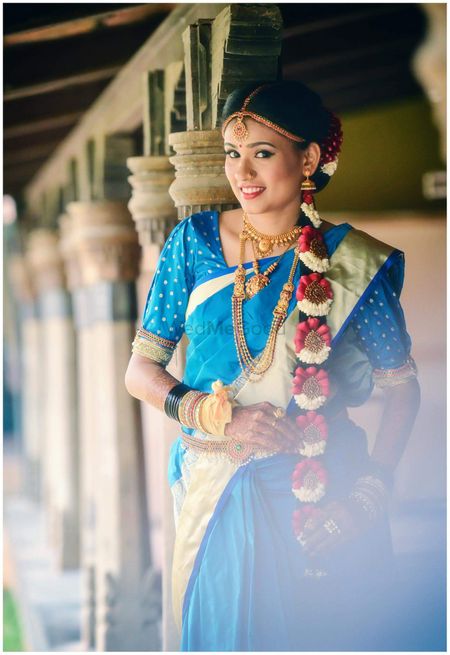 Photo of Smiling south indian bride shot