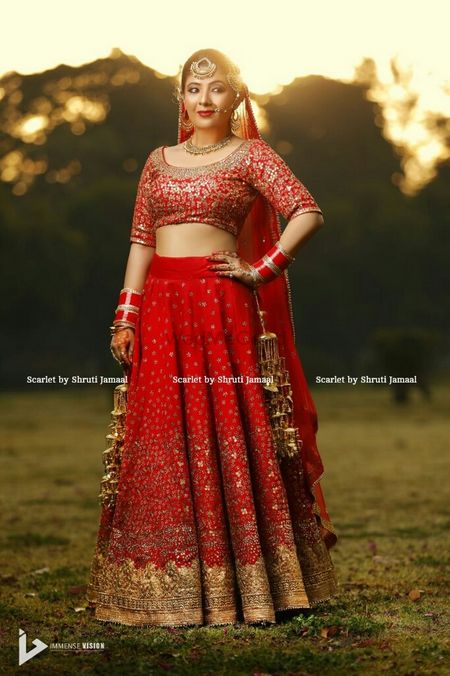 Red bridal dupatta with sequins and single dupatta drape