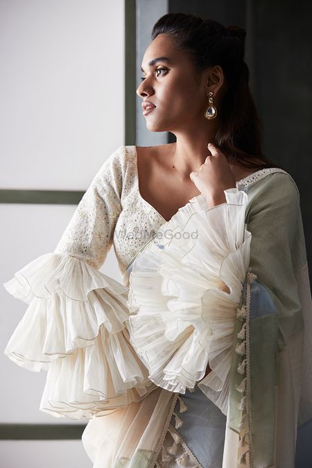Unique frill blouse with saree in white