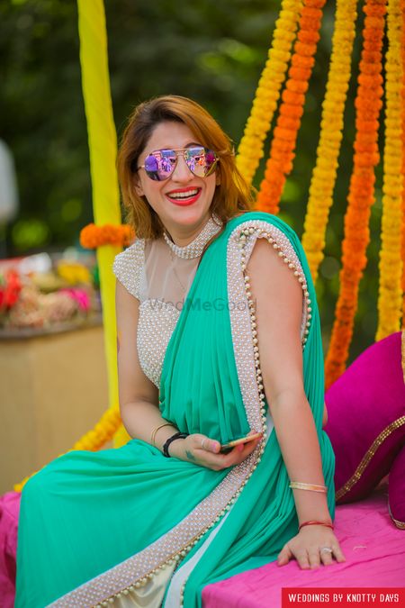 Pearl studded saree and blouse in turquoise and white