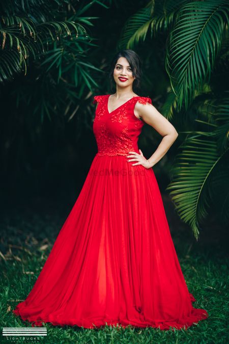 Red flared gown for pre wedding shoot