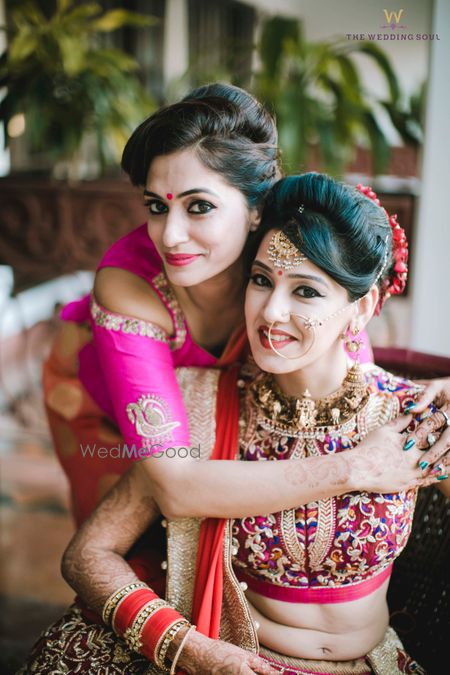 Photo of Bride with sister portrait