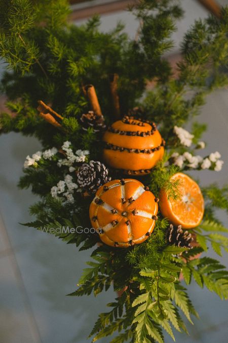 Photo of Oranges in unique centrepiece