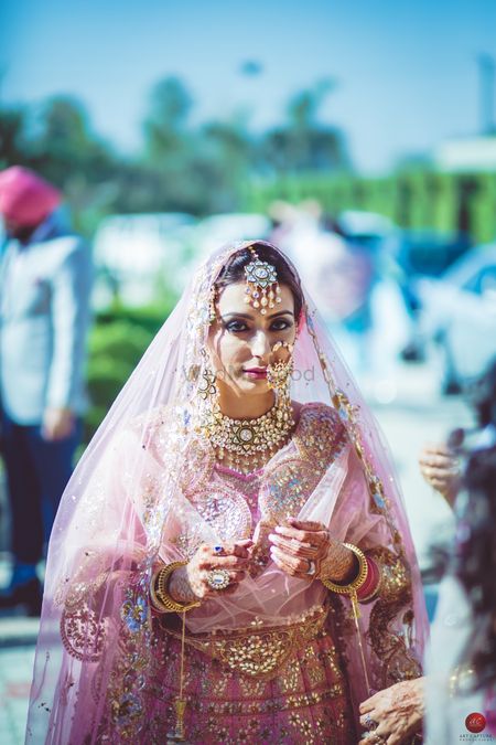 Sikh bridal portrait in light pink lehenga