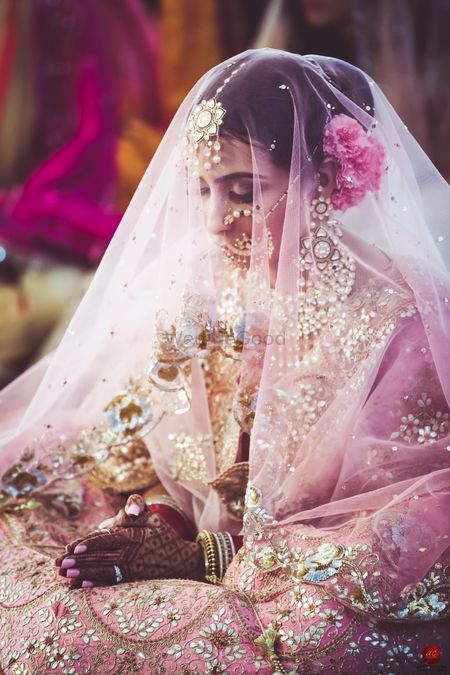 Bridal portrait with veil as dupatta on face