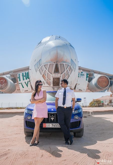Pre wedding shoot with an airplane and car