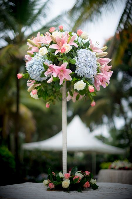 Photo of Unique table floral centrepiece on a stick