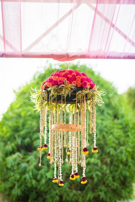 Suspended floral arrangement for wedding