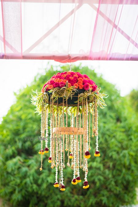 Suspended floral arrangement for wedding